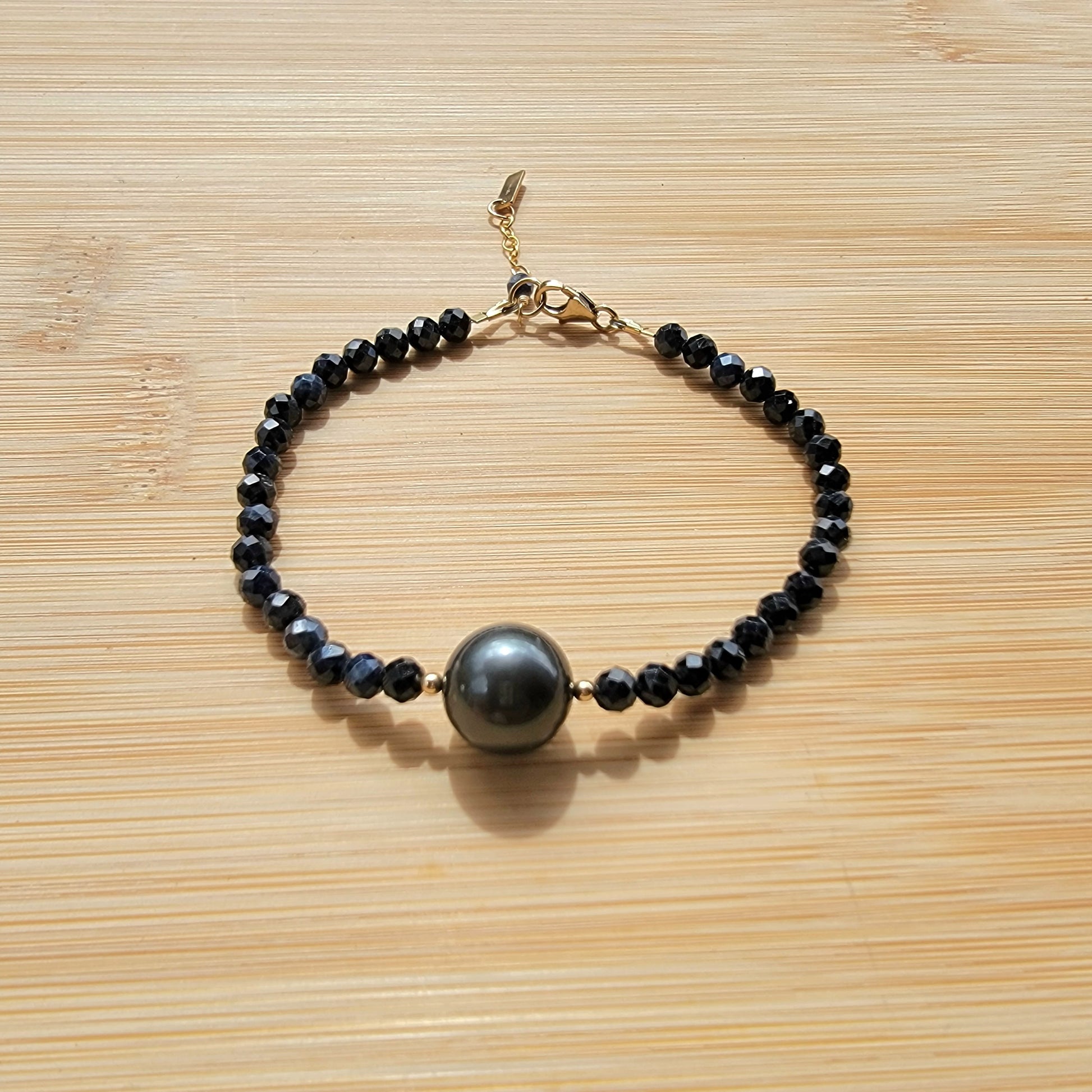 Tahitian Pearl Bracelet with genuine real sapphire gemstones crystals, black south sea pearl